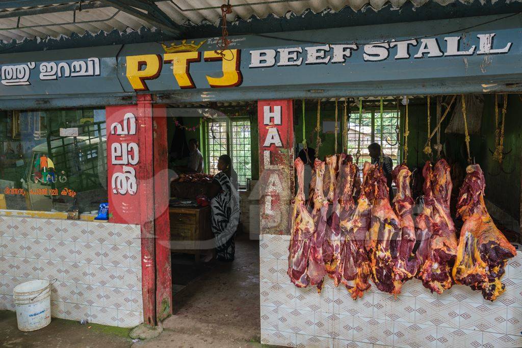Indian cow or beef meat hanging up outside beef stall or shop, Munnar, Kerala, India, 2018