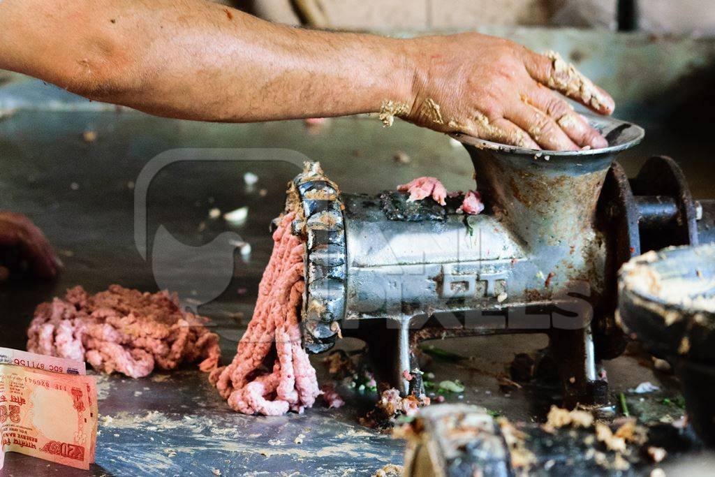 Mutton meat grinder at Crawford meat market