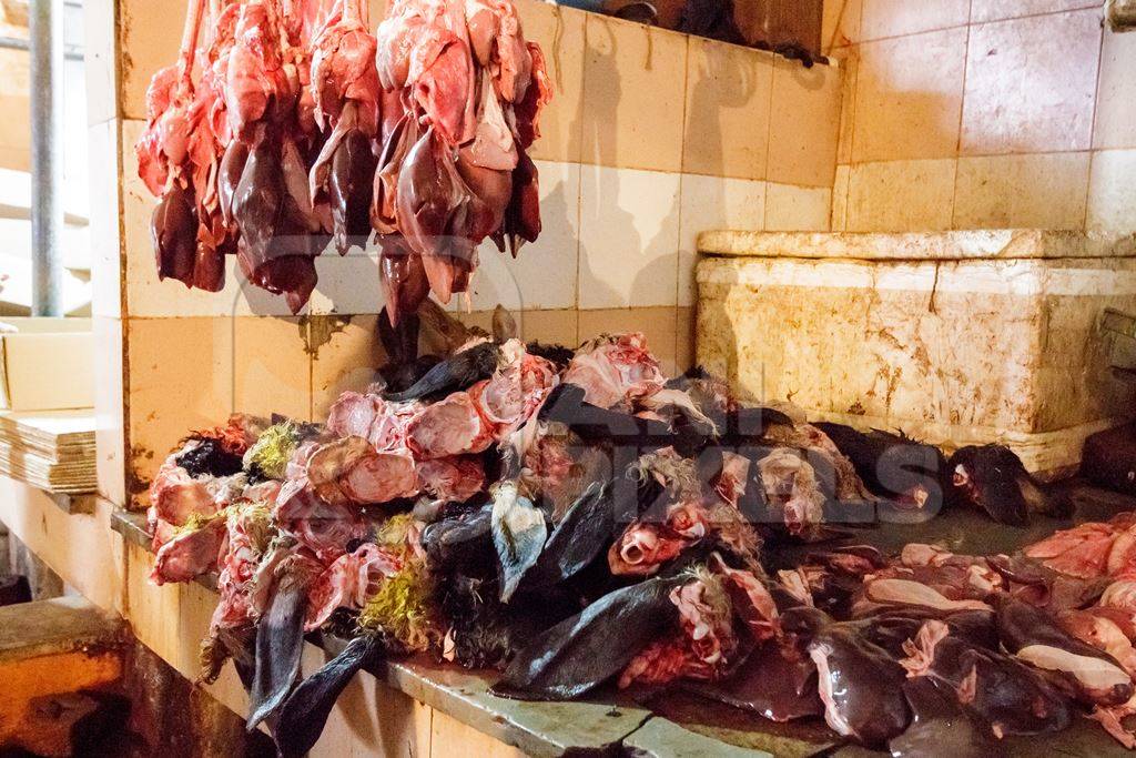 Goat meat hanging up at mutton shops in Crawford meat market, Mumbai, India, 2016