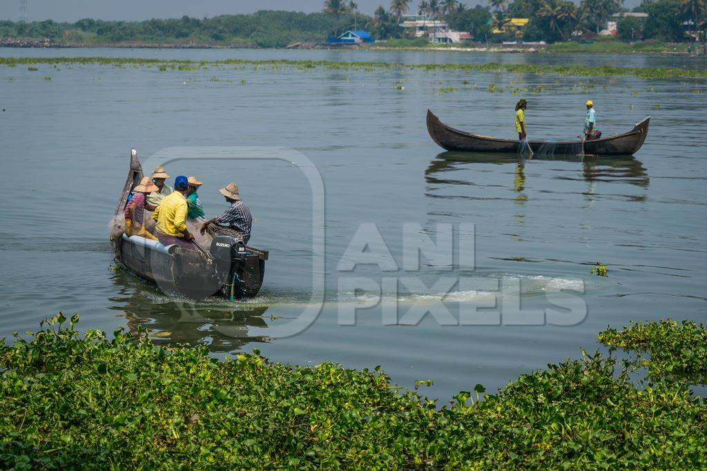 Fishing boats on the water at Kochi harbour in Kerala