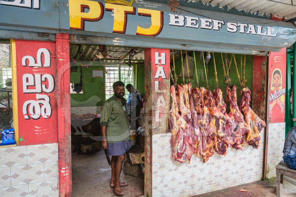 Indian cow or beef meat hanging up outside beef stall or shop , Munnar, Kerala, India, 2018